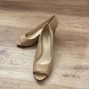 Cole Haan nude/tan peep-toe 3” heels.